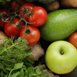 Imagem de uma variedade de frutas e legumes com legenda "Frutas e Legumes... Comprovados Para Fazerem Você Se Sentir Melhor" GeneWei.com